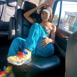 Turquoise nylon track pants